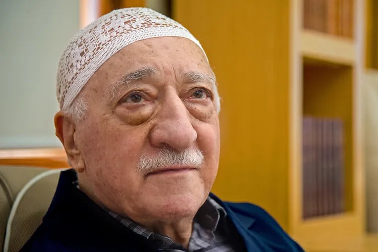 Fethullah Gülen sits among his guests during an afternoon prayer at his property in Saylorsburg, Pa., in 2019.