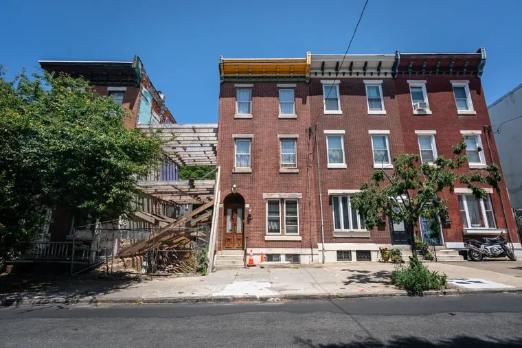 Residents along Poplar Street said their homes have sustained extensive structural damage since workers knocked down an adjacent rowhouse and began excavating for a deeper basement.