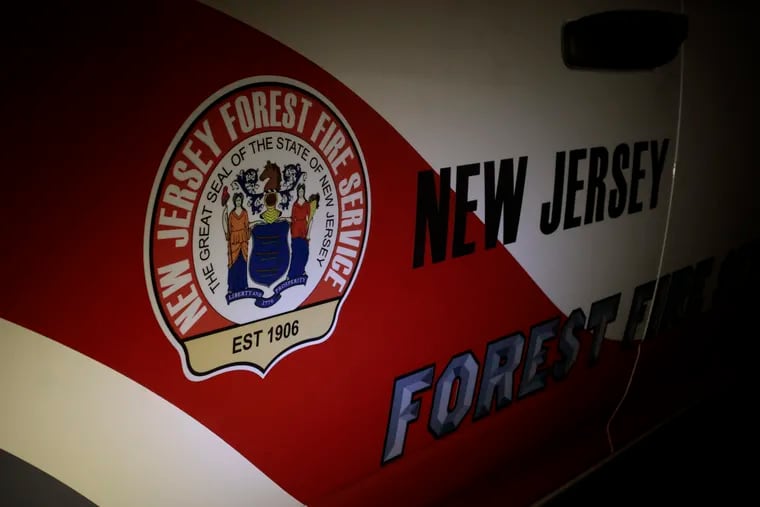 The New Jersey Forest Fire Service said a blaze potentially sparked by a plane crash in Lacey Township had swelled but was mostly contained by Monday afternoon.