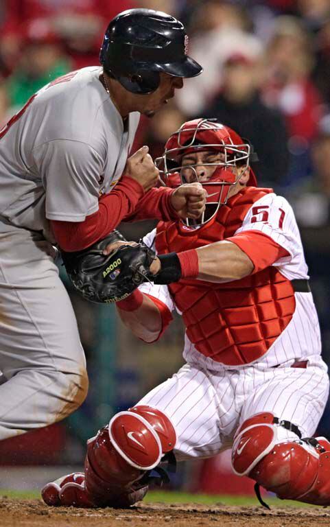 Philadelphia Phillies Carlos Ruiz makes a blessing as he crosses home plate  after hitting a solo home run in the second inning of game three of World  Series in Philadelphia, Pennsylvania on