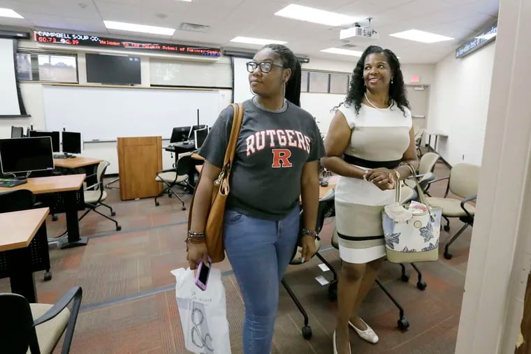 Rutgers-Camden freshman Sierra Neal and her mother, Daphne, tour a classroom.