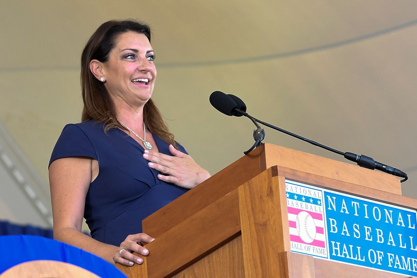 Brandy Halladay speaks at her late husband Roy's Hall of Fame induction last July in Cooperstown, N.Y.