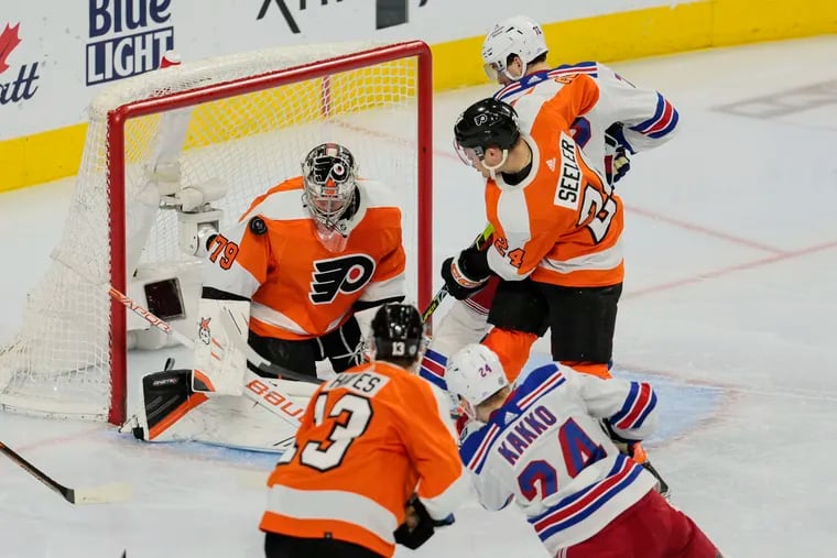 Flyers goalie Carter Hart stops the shot of  Rangers Kaapo Kakko during the second period at the Wells Fargo Center in Philadelphia, Wednesday, March 1, 2023.