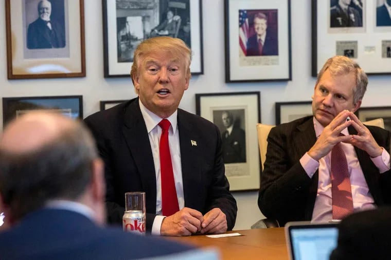 President-elect Donald Trump (left), in a meeting Tuesday at the New York Times, sits next to publisher publisher Arthur Sulzberger Jr.
