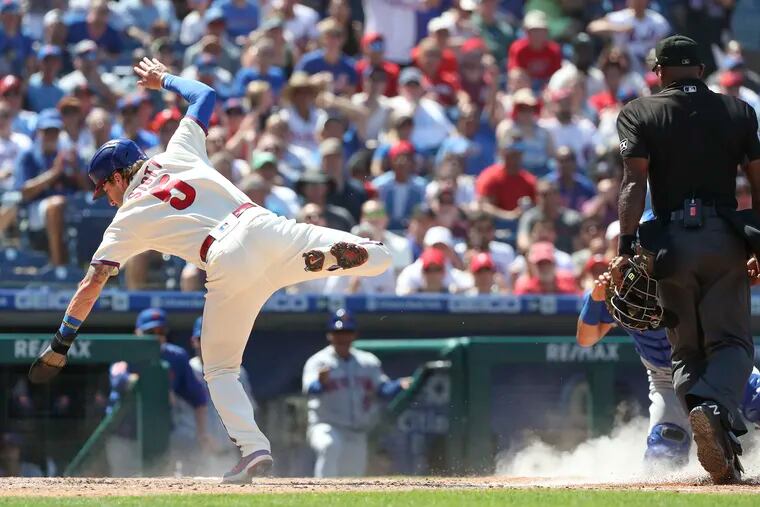 Photos of the Phillies' 8-2 loss to the Mets