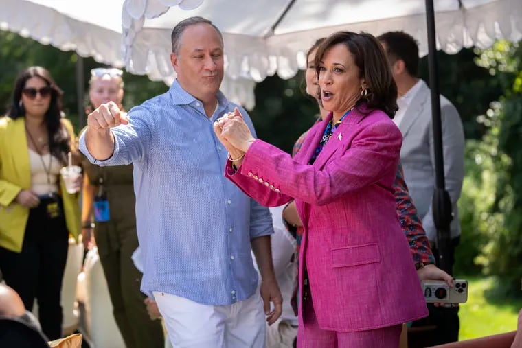 Vice President Kamala Harris and her husband Doug Emhoff dance together in September.