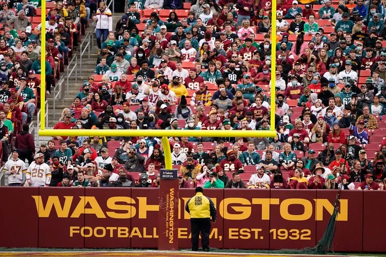 Fans sitting in a section behind the goal posts during Sunday's game between the Eagles and the Washington Football Team in Landover, Md.