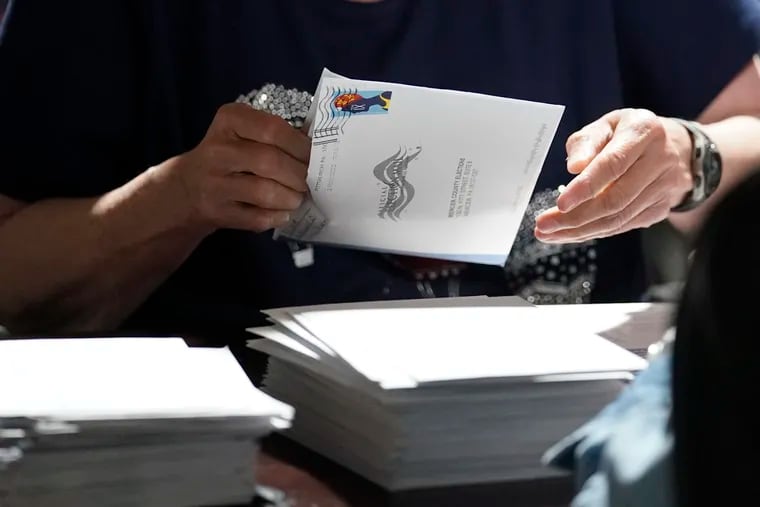 An election worker in Mercer continues the process of counting ballots in the Pennsylvania primary election.