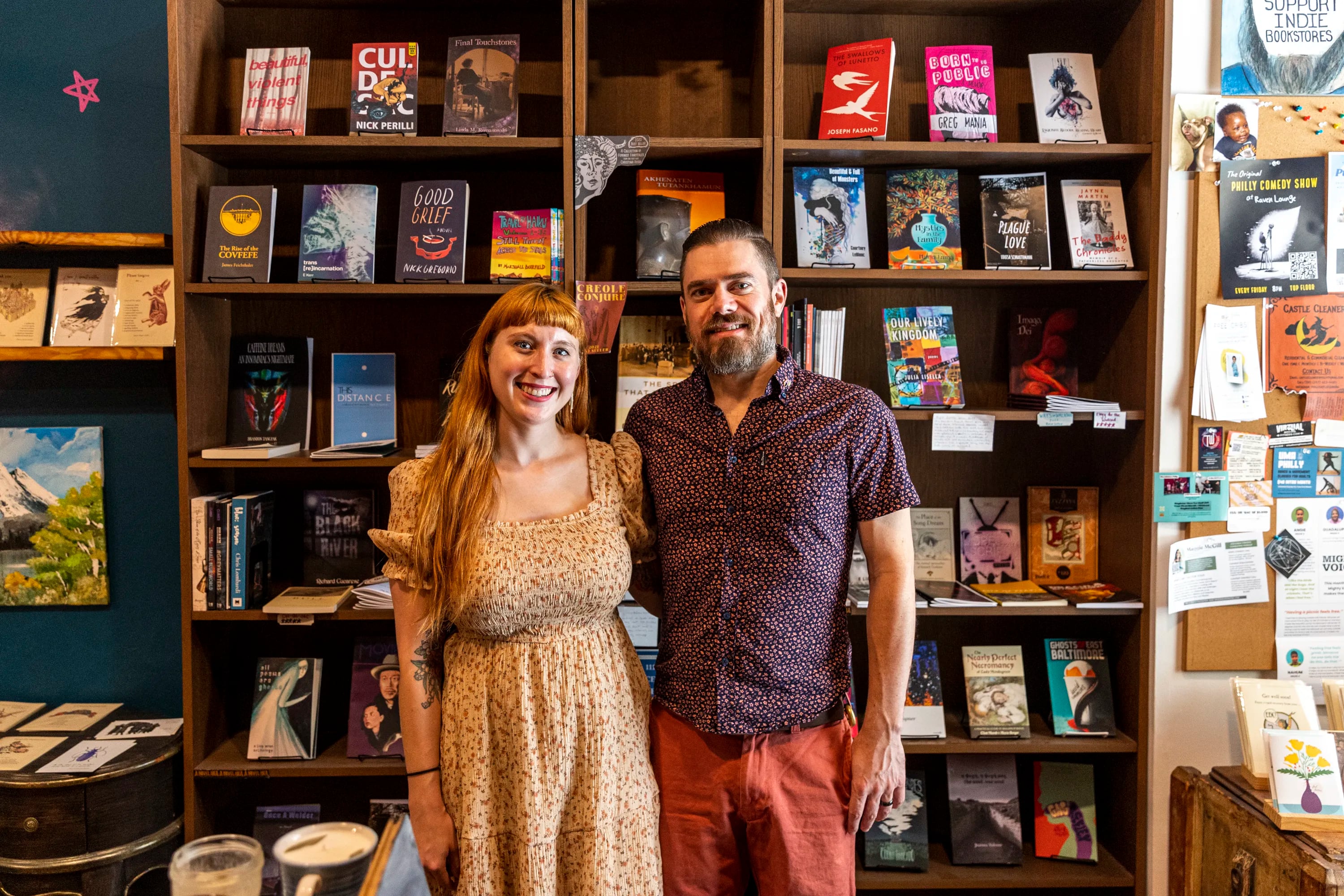 Alex Schneider, 39, and Christina Rosso-Schneider, 32, of Drexel Hill, owners of A Novel Idea bookshop, pose for a portrait in their shop in South Philadelphia, Pa., on Wednesday, July 12, 2023.