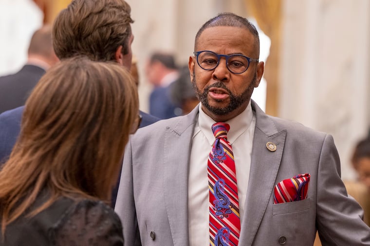 City Councilmember Curtis Jones Jr. stands in Council's chambers during a meeting in September 2023.