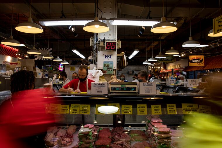 People are making last minute trips to Godshalls Poultry for turkeys and other ingredients for Thanksgiving at Reading Terminal Market.