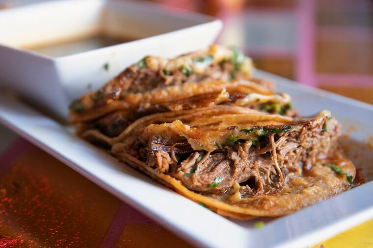 Birria beef tacos at Juana Tamale. You can get birria-egg breakfast tacos there, too.