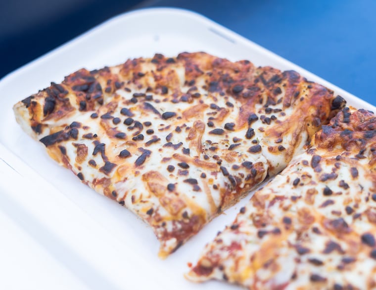 Slices of cheese pizza from Franklin Square Pizza concession stand at Citizens Bank Park.