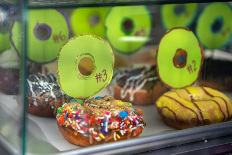 Diners can vote for their favorite donut among shop employee recipes — #3 is the “Godzilla” by Lizzie Angelopeos — at Fractured Prune Donuts in Sea Isle City, Monday, July 24, 2023.