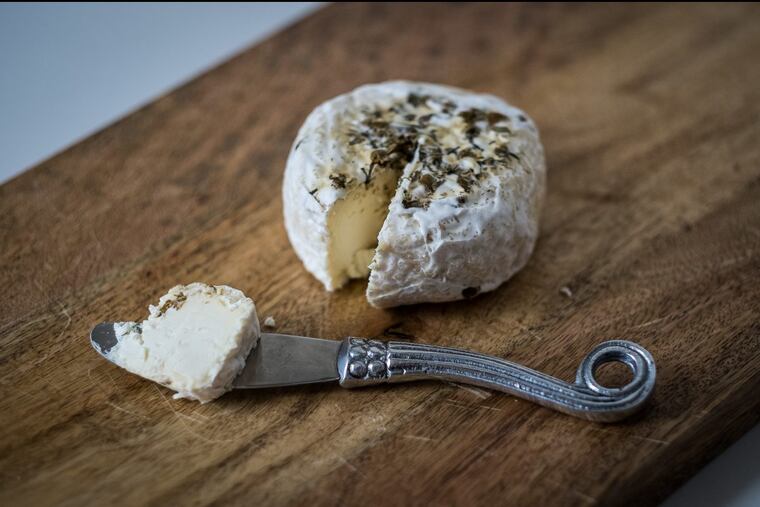 Honey Bell, a lovely local cow’s milk cheese topped with summer chamomile made by Valley Milkhouse for the Collective Creamery.