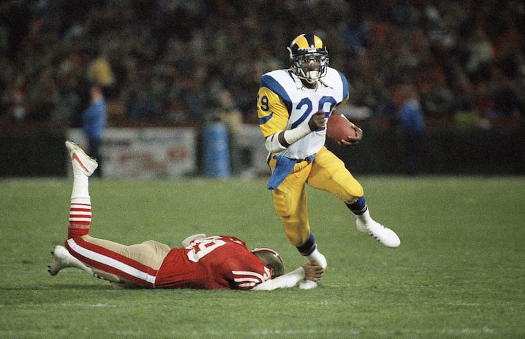 Eric Dickerson, seen her rushing against the 49ers during the 1984 season, still holds the NFL record for most rushing yards in a season.