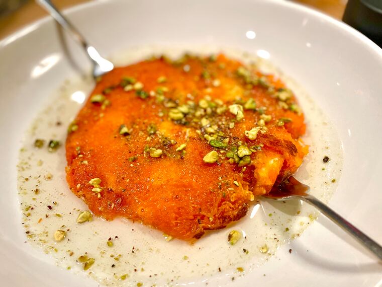 The knafeh Nablusi for two -- oozy cheese between crispy kataifi doused in rosewater syrup -- is one of the dessert highlights at Renata's in University City.