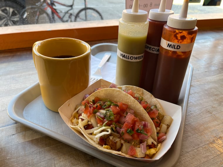 Breakfast tacos at Taco Taco Mexican come with potatoes, pico, and cheese.