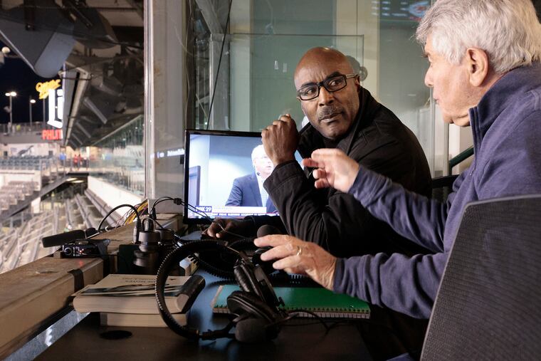 Eagles radio announcers Mike Quick (left) and Merrill Reese will call today's game on 94.1 WIP. 