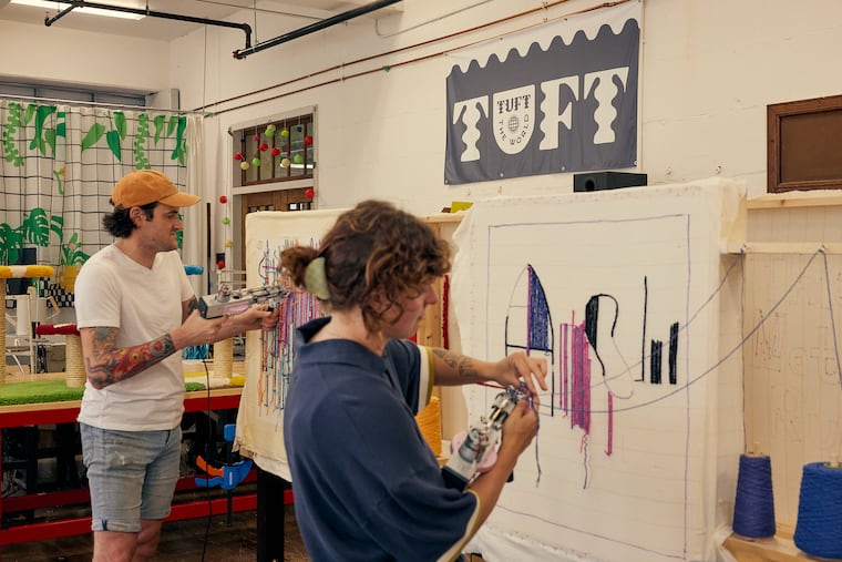 Philly offers a variety of classes, including tufting rugs with Tuft the World at the Bok Building with instructors like Grace Maas (up front).