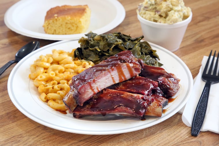 Ribs with homemade collard greens and mac and cheese at HenriÕs Hotts Barbecue, in Hammonton, Friday, Feb. 25, 2022.  VERNON OGRODNEK / For The Inquirer