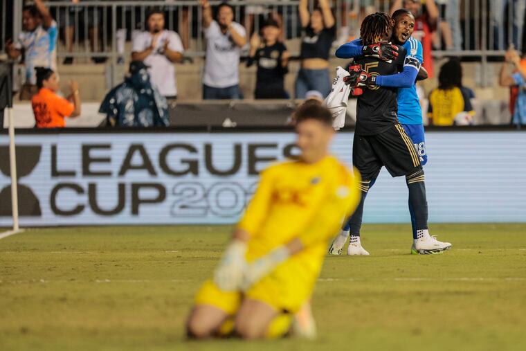 Union's Olivier Mbaizo celebrates after scoring the final penalty kick to beat DC United last week. 