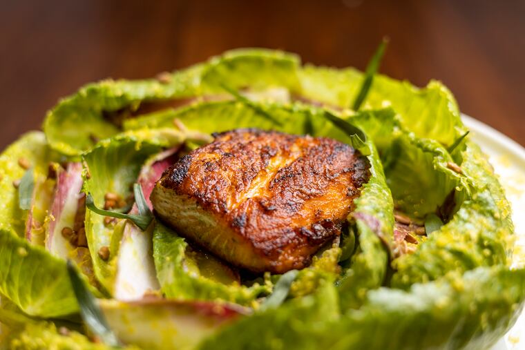 The endive & baby gem salad with tarragon vinaigrette and salmon at Vernick Fish in Philadelphia, Pa., on Thursday, Feb. 8, 2024.