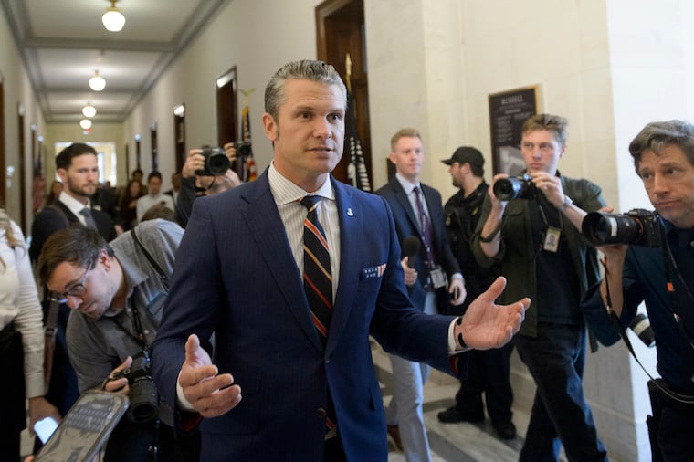 Pete Hegseth, President-elect Donald Trump's pick for Secretary of Defense, speaks with reporters following a meeting with senators on Capitol Hill, Thursday, Nov. 21, 2024, in Washington. 