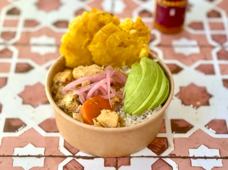 The pollito bowl at Amy's Pastelillos inlcudes chicken, rice, avocado and tostones.