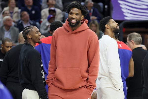 From left, Tyrese Maxey, Joel Embiid, and Paul George have been in street clothes for several Sixers games this season. 