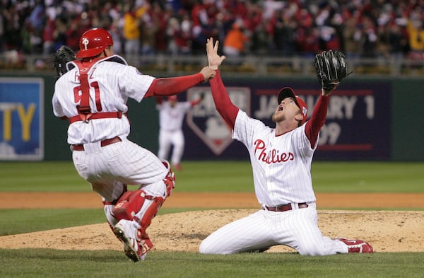 Brad Lidge and catcher Carlos Ruiz celebrate after Lidge struck out the final batter in the ninth inning during Game 5 of the 2008 World Series.