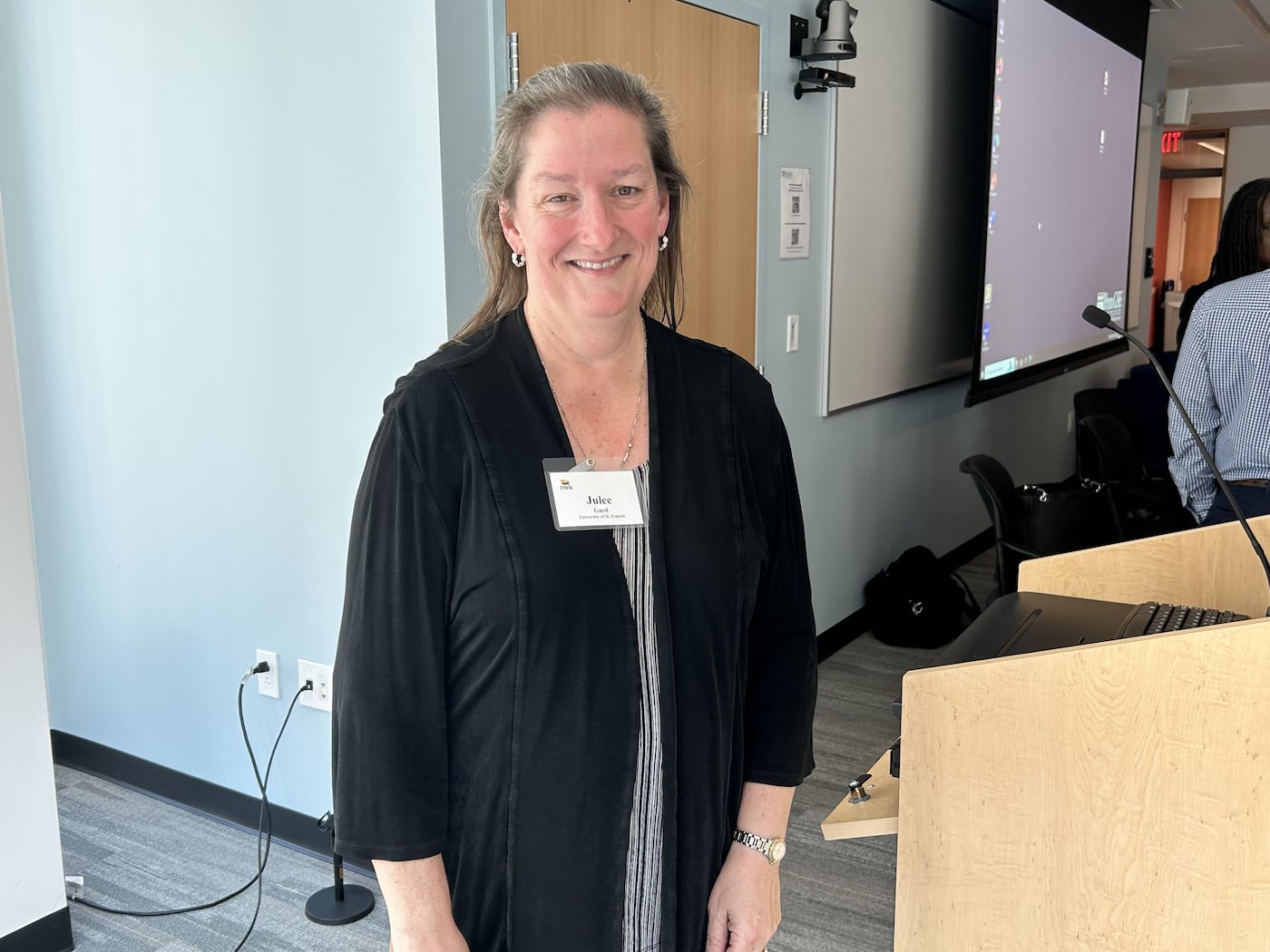 Julee Gard, who created the financial viability index, speaks at an Education Writers Association meeting held at the University of Pennsylvania in September.