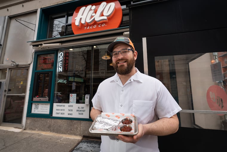 Jeff Newman with Hi-Lo Taco's signature burnt-ends breakfast tacos in Center City.