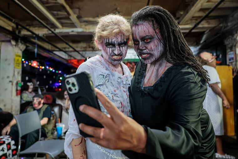 Darlene Coleman (right) takes a selfie with Charmaine Warrington at Fright Factory in South Philly, before their show, on Friday, October 6, 2023.