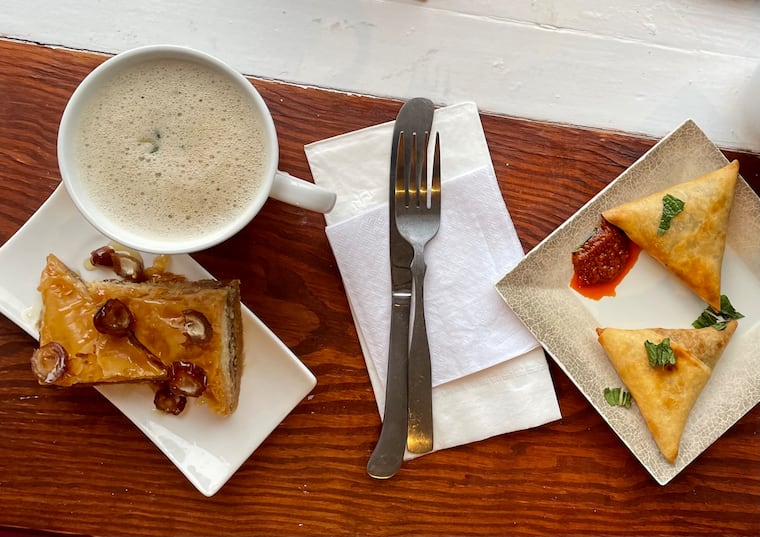 Warm up with the homeland shai, baklava, and sambusa at Buna Cafe.