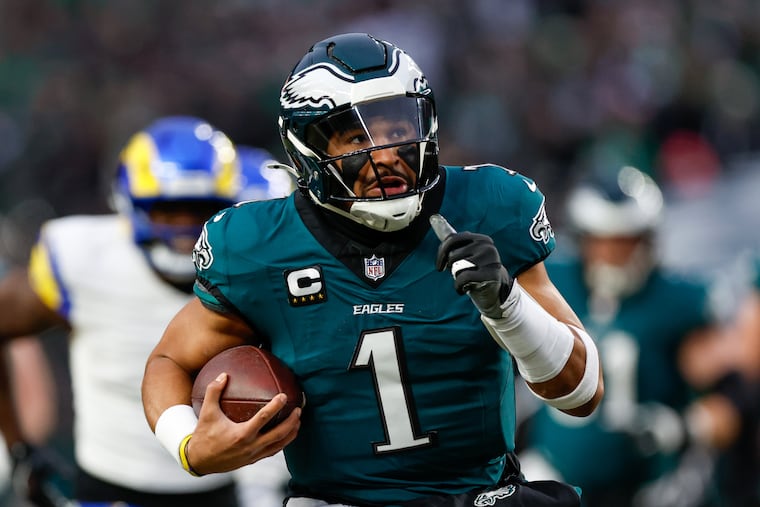 Eagles quarterback Jalen Hurts celebrates a touchdown during the first quarter of a NFC divisional playoff game against the Rams on Sunday, Jan. 19, 2025, in Philadelphia.