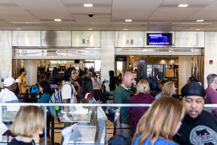 People waiting in the TSA line at Philadelphia International Airport. 