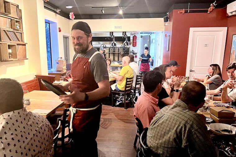 Chef Michael Brenfleck in the dining room of Little Walter's at Coral and Hagert Streets.