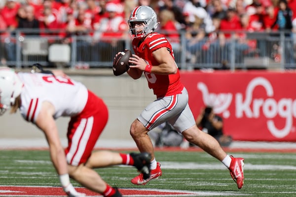 Ohio State quarterback Will Howard looks for an open receiver against Nebraska during the first half Saturday.
