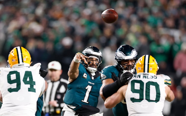 Eagles quarterback Jalen Hurts throws a pass against the Green Bay Packers in a NFC wild card playoff game on Sunday.