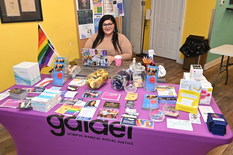 Hazel Edwards sits at her desk at Galaei, which offers Narcan, condoms, and various testing kits. The group helped her when she was homeless. "I had to survive," she says.