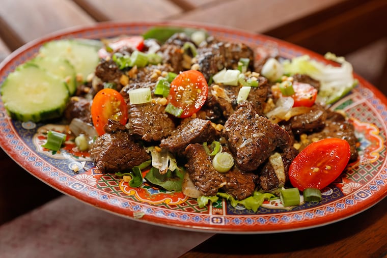 The Shaken Beef (wok charred, marinated filet mignon cubes, onion, grape tomatoes) at Gabriella’s Vietnam, 1837 E. Passyunk Ave. in Phila., Pa. on June 26, 2021.