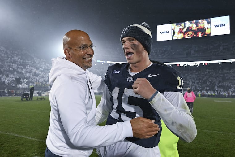 Penn State head coach James Franklin celebrates with Drew Allar after last week's win against Iowa. 