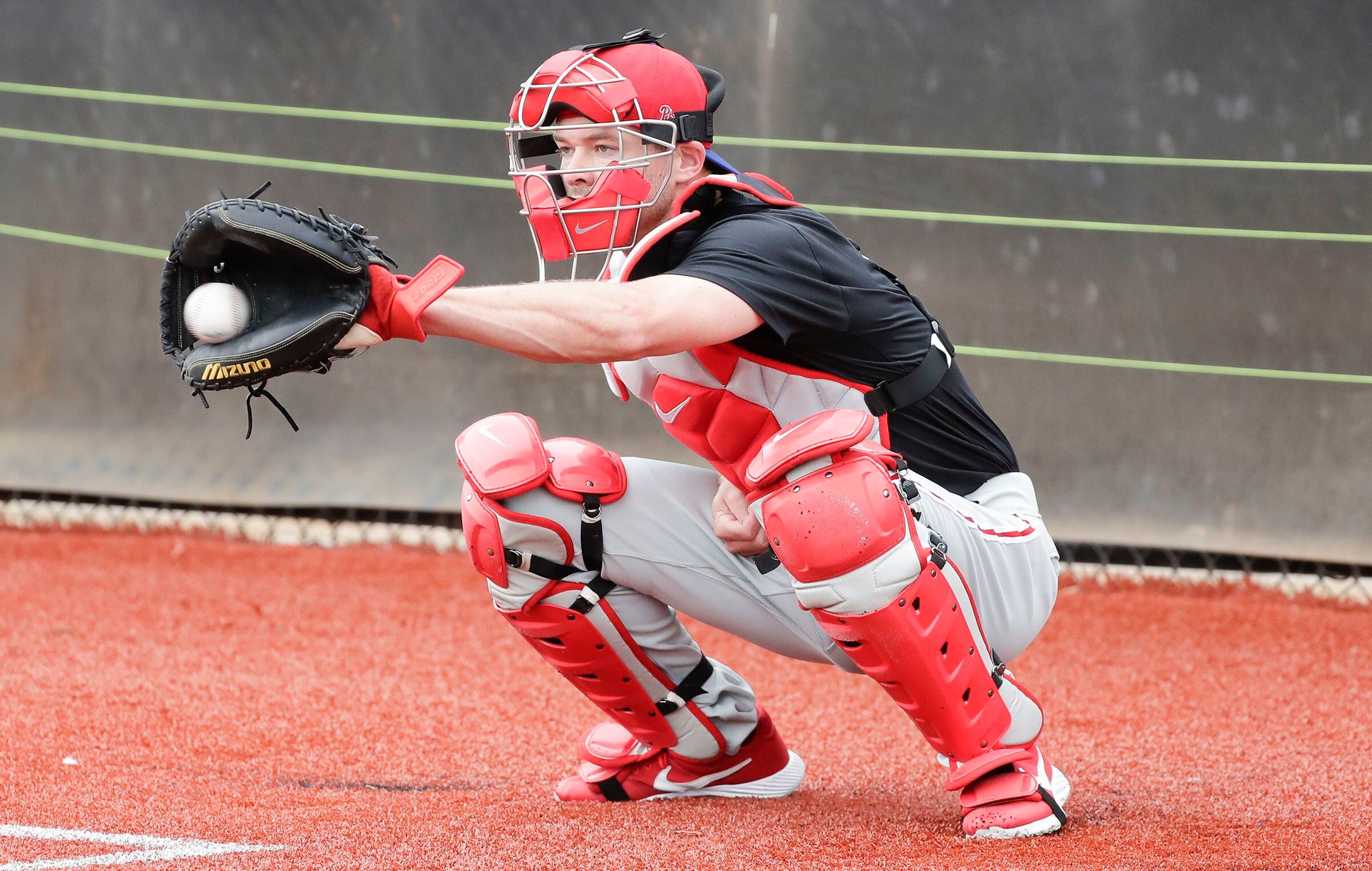 PHILS JT REALMUTO CATCHES IN SPRING TRAINING WEARING A CAST!