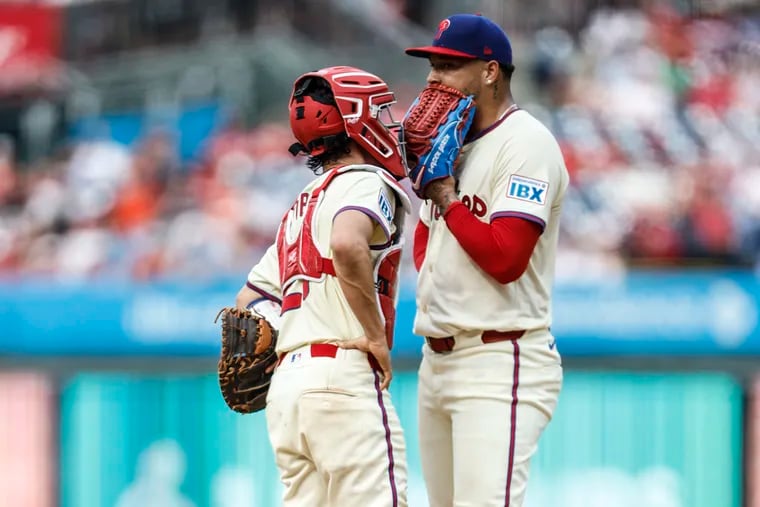 Phillies catcher Garrett Stubbs tries to settle down Taijuan Walker during the loss to the Astros on Wednesday.