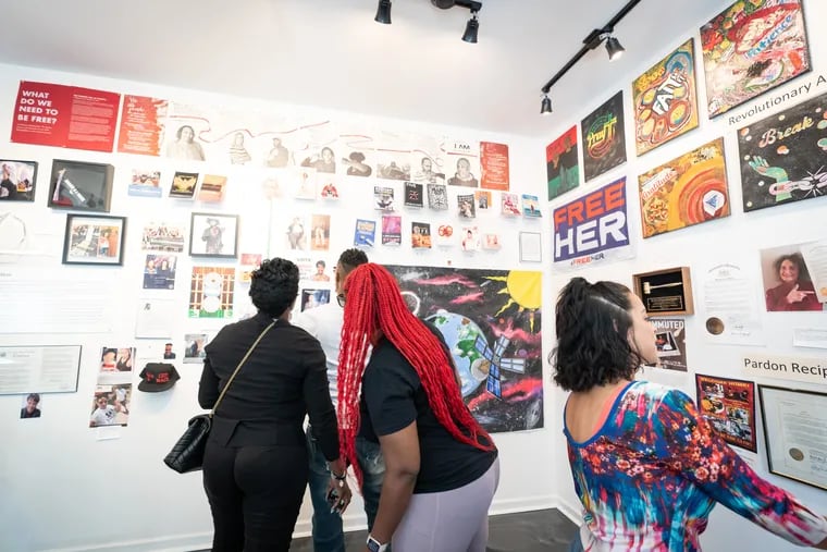 Visitors get a first look at the gallery at the opening of the Formerly Incarcerated Renaissance Museum (FIRM), a project by Why Not Prosper and Rev. Michelle Simmons to honor the artistic talent of formerly incarcerated people and display artifacts relevant to the experiences of people in prison.