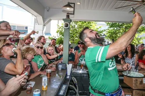 Jason Kelce and friends chug beer, play flip cup, and sing karaoke at Jersey Shore
