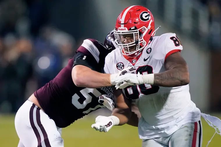Georgia defensive lineman Jalen Carter (88) pushes past a block by Mississippi State offensive lineman Cole Smith on Nov. 12.