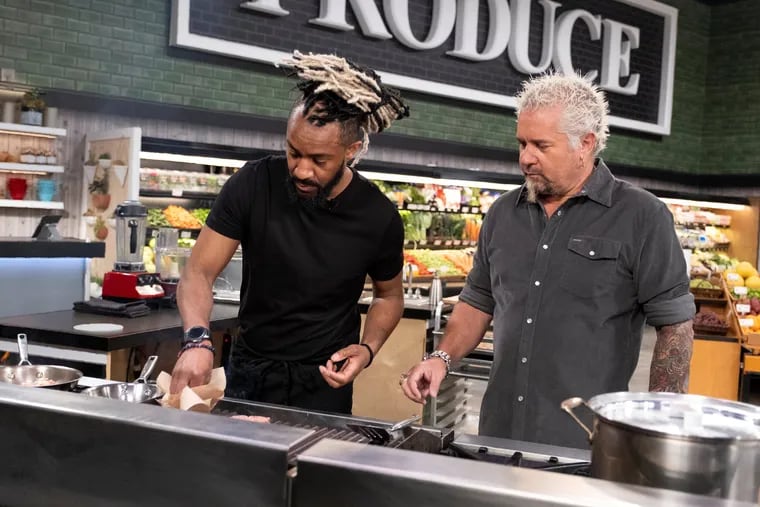 Justin Coleman (left), owner of Bake'n Bacon, appearing with Guy Fieri on "Guy's Grocery Games."