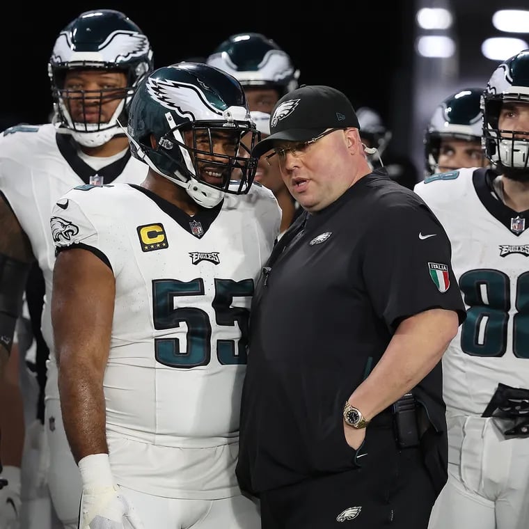 Eagles chief security officer Dom DiSandro (right) as the team waits for introductions before the start of their Jan. 15 playoff game against the Buccaneers.
